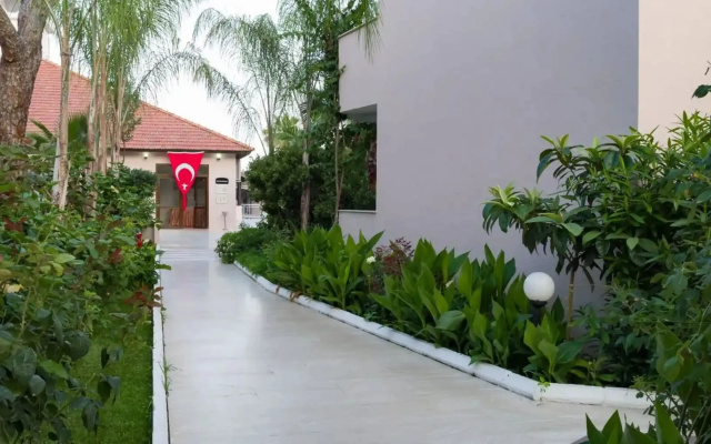 Отель MG Club Akman Beach Hotel
