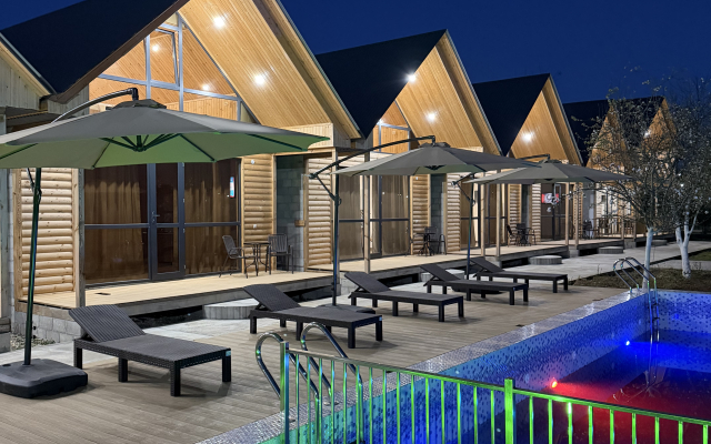 Курортный отель Akhan Resort Gagra - Виллы у реки с видом на горы возле моря