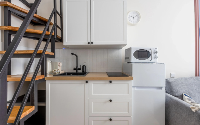 Квартира Двухуровневая Cтудия на Садовой