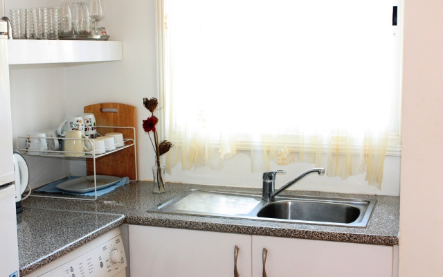 Green Oasis Beach Apartments