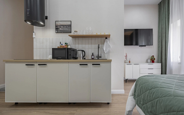 Апартаменты Уютная Студия на Улице Рождественской