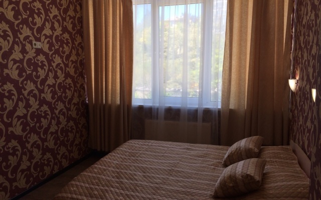 V Tsentre Goroda Apartments