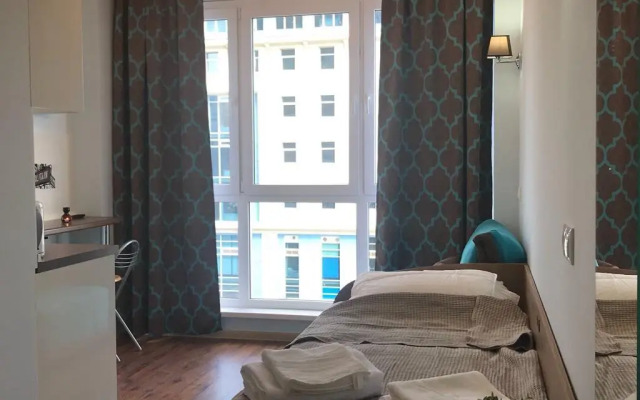 Апартаменты Маленькая студия с большим панорамным окном