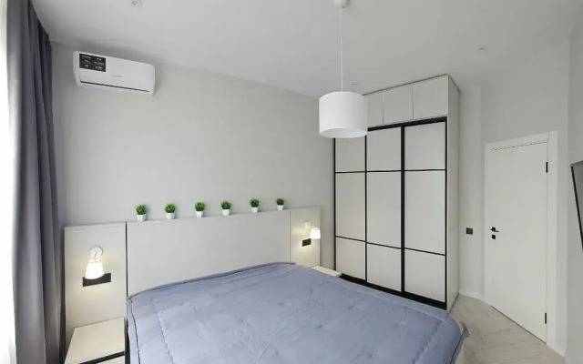 Апартаменты на Набережной 75к5 (102.5)