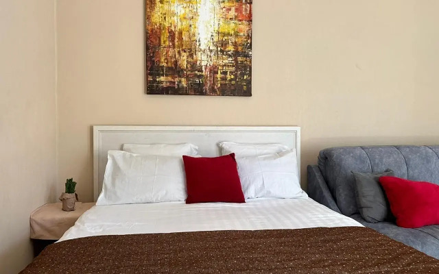 Квартира с двориком рядом с песчаным пляжем