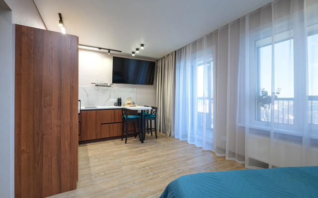 Квартира Новая студия в 5 минутах от ТРЦ Аура