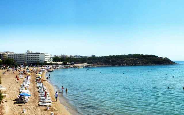 Отель Tuntas Beach Altinkum