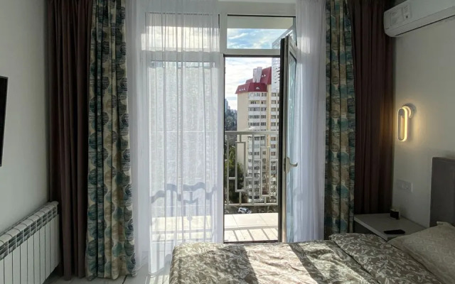 Апартаменты-студия 30 кв.м. с кроватью и балконом, 15 этаж