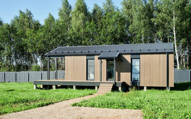 Частный дом с сауной, детской и спортивной площадкой