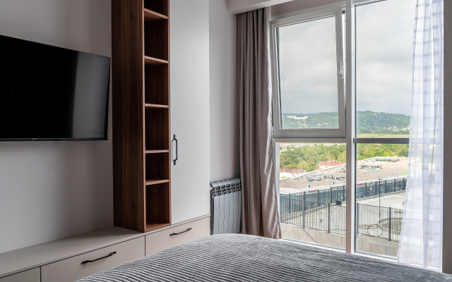 Апартаменты Стильная студия с дизайнерским ремонтом