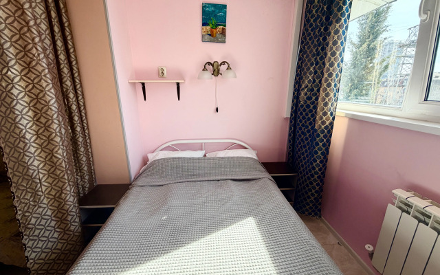 Апартаменты Уютная студия с кроватью и диваном