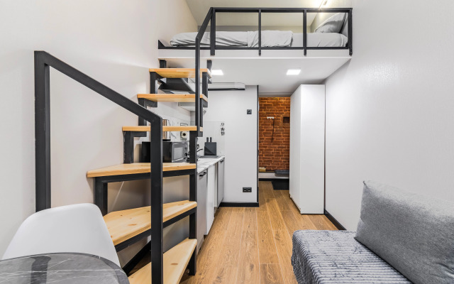 Квартира Уютная двухъярусная студия в центре