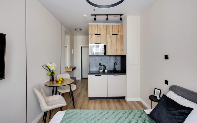 Апартаменты Уютная Студия у Метро Ботанический Сад