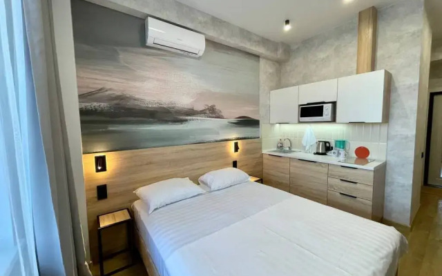 Апартаменты В Гости! на Запорожской 69 (студия 4)