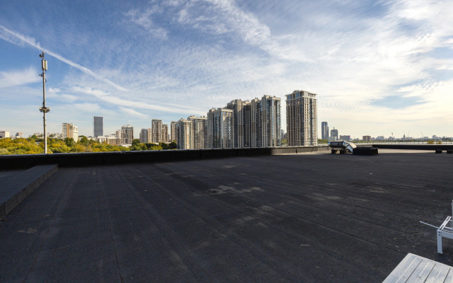 Апартаменты Уютная Студия у Метро Ботанический Сад