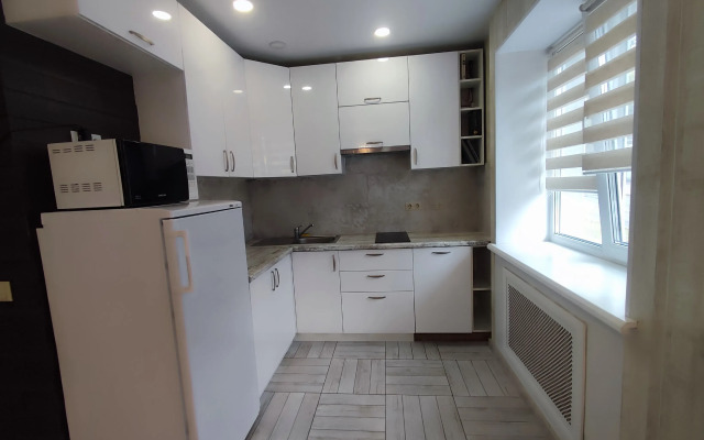 V Tikhom Tsentre Goroda Apartments