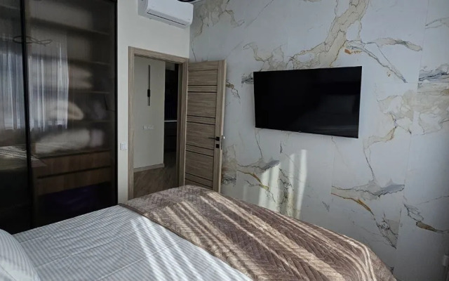 Апартаменты на Набережной 75к4 (104.4)