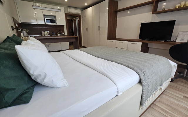 Апартаменты Стильная студия Riva на 12 этаже