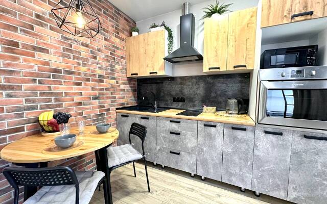V Novom Dome Flat