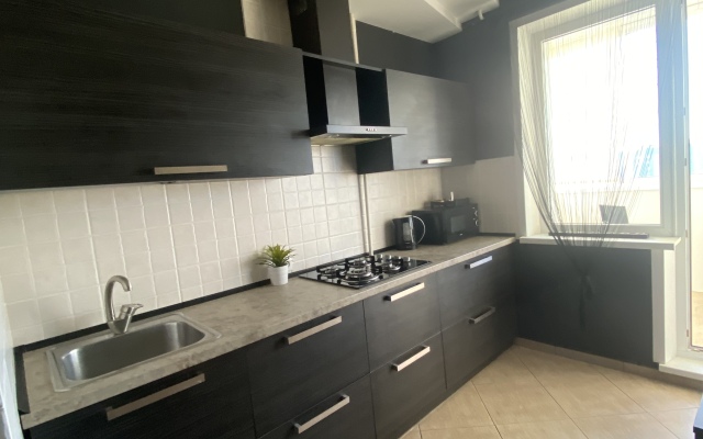 Na Kurchatova Apartments