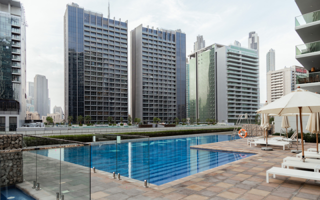 Апартаменты Luxurious 1BR at Keyrock Pool & Gym Access