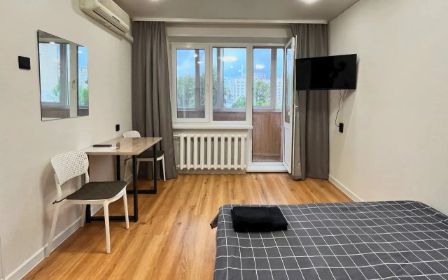 Квартира Уютная студия со всеми удобствами