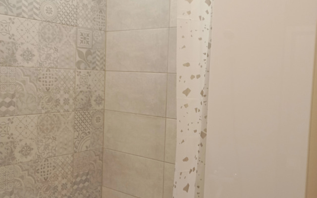 Квартира Уютная студия в рядом с ДРКБ