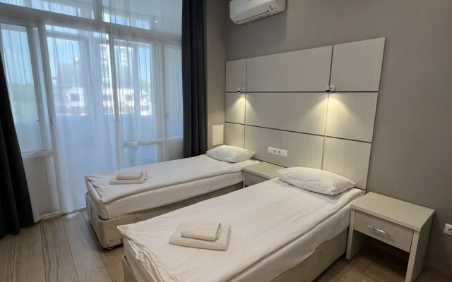 Апартаменты Svetlana District by the sea 3