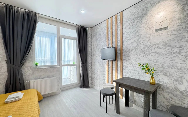 Квартира Уютная студия с панорамной лоджией