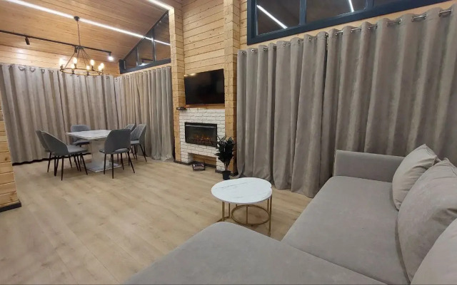 Villa Derevyanny Dom with fireplace V Lesu Na Slavyanskoy