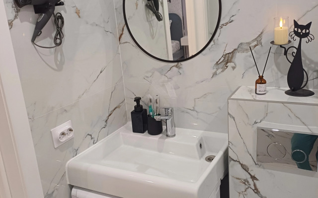 Апартаменты Уютная студия в шаге от пляжа