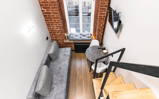 Квартира Уютная двухъярусная студия в центре