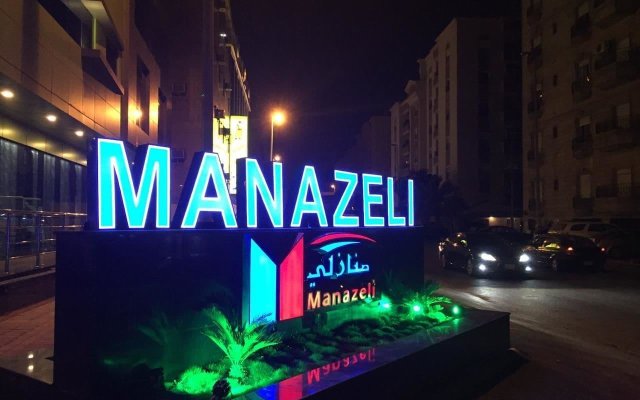 Отель Manazeli Al Corniche