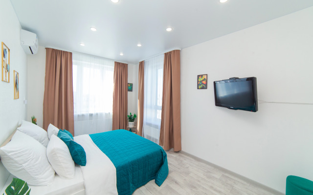 Na 16 Etazhe s Zavorazhivayuschimi Zakatami Apartments