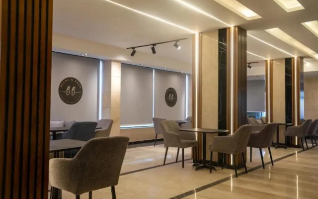 Отель Aura Inn Tiba Pyramids