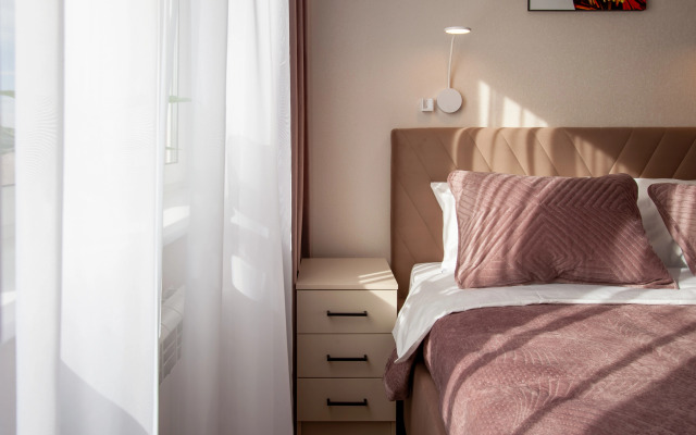 Квартира Гармония Уютная в Центре Города с Отдельной Спальней