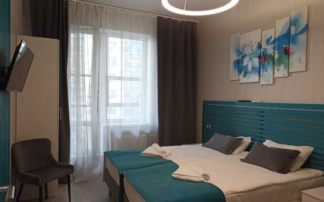 Studiya lyuks s lodzhiey Apartments