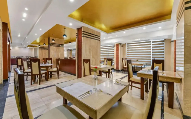 Отель Aura Inn Tiba Pyramids