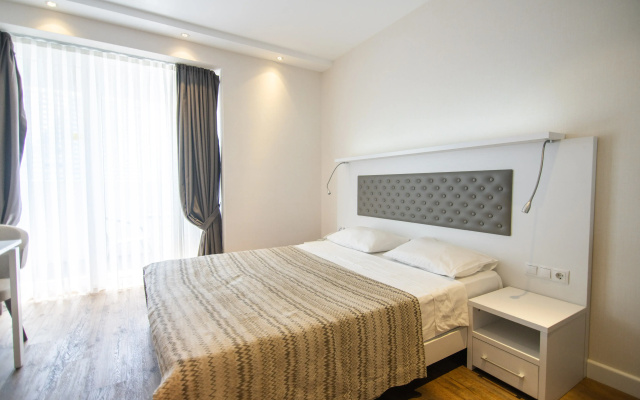 Apartamenty Bright Apartment with Balcony in Alliance Palace Batumi - Steps from the Sea & Dancing Fountains