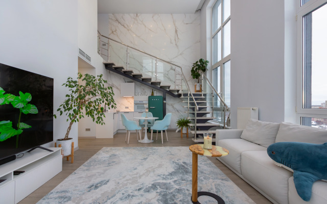 Апартаменты Двухуровневые апартаменты с двумя спальнями