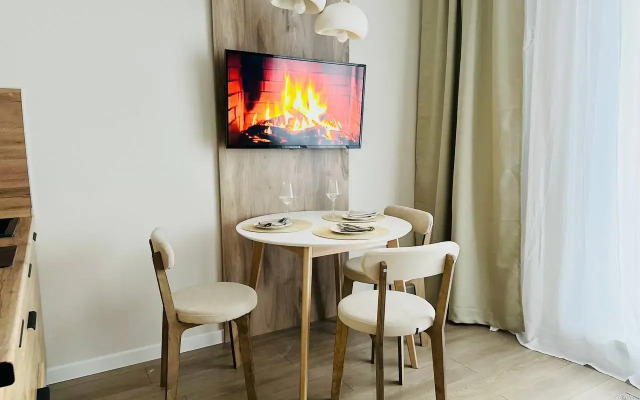 Квартира Поделам с балконом на 14 этаже у арены Трактор