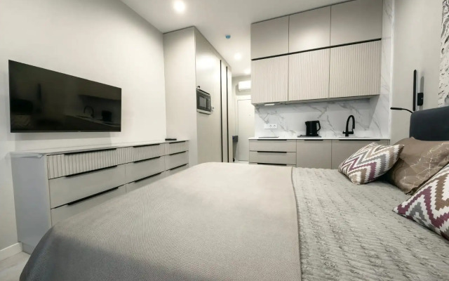 Uyutnaya Studiya s Pryamym Vidom na More Apartments
