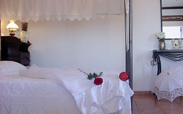 Отель Porto Scoutari Romantic Hotel & Suites