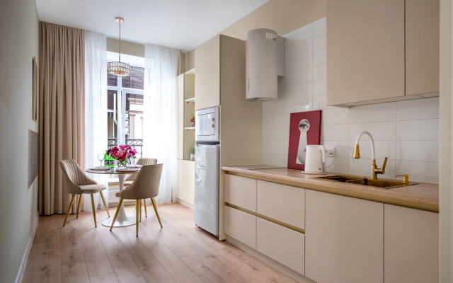 V Samom Tsentre Flat