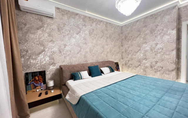 V Tsentre Goroda Flat