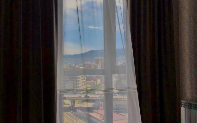 Апартаменты С Видом на Горы и Город