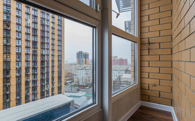 Квартира Уютная студия с видом на колесо обозрение Одно небо