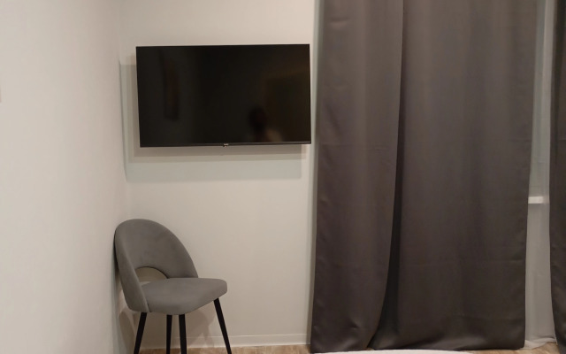 Квартира Уютная студия в рядом с ДРКБ