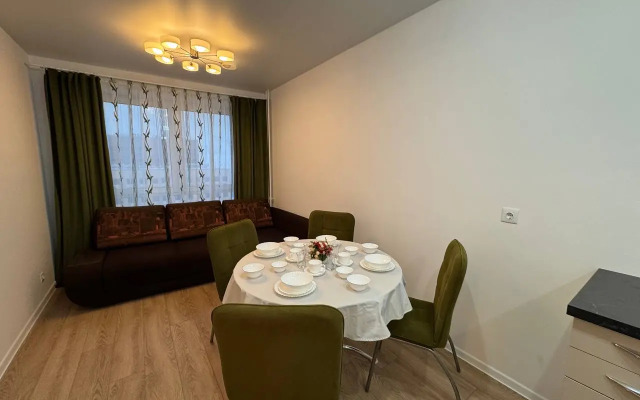 Квартира Уютная с отдельной спальней