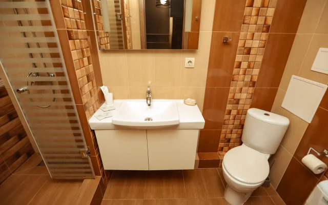 Studiya Uluchshenaya Apartments